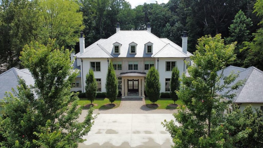 Aerial photo of luxury home clean roof done by roof washing company in Charlotte NC