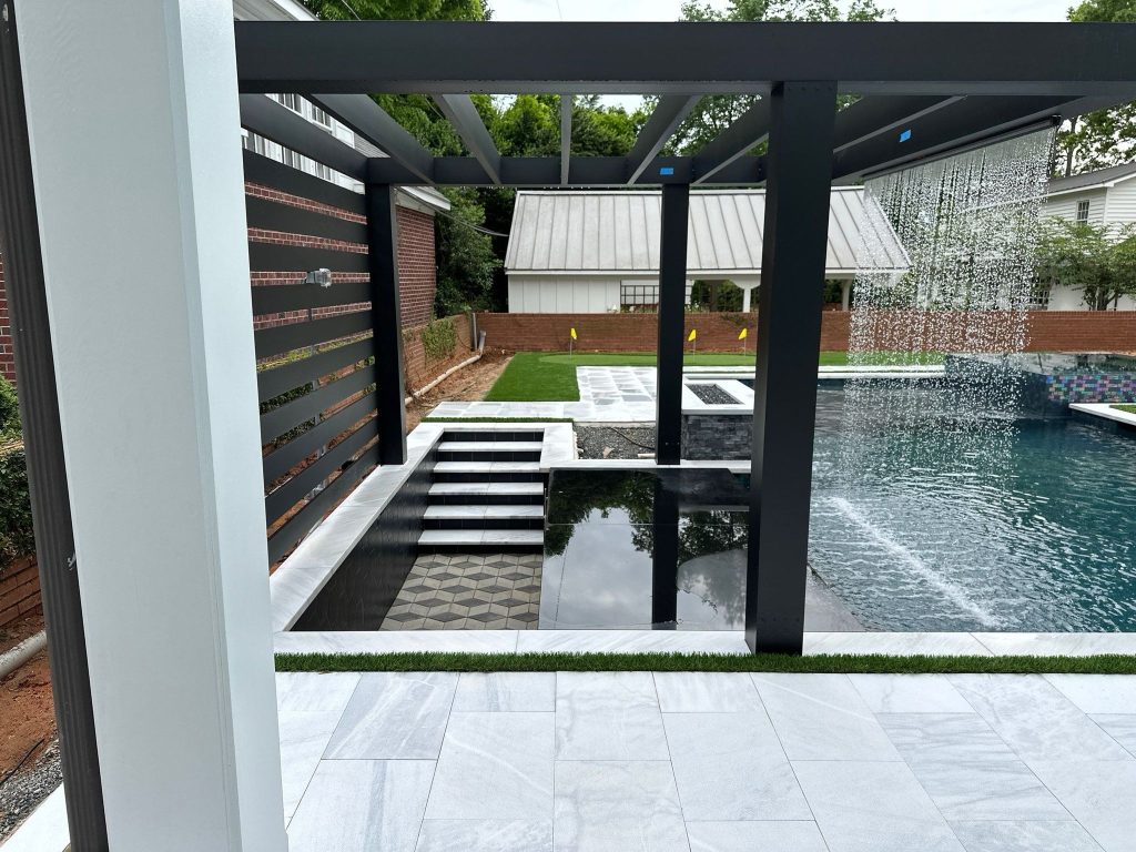 Beautiful luxury home's clean pool deck and exterior. Cleaned by luxury home pressure washers Charlotte Exterior Services in Charlotte NC